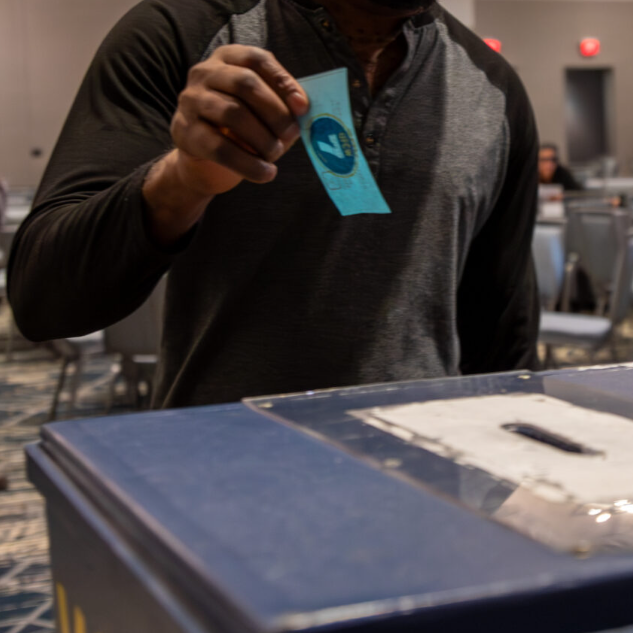 a union worker votes to strike